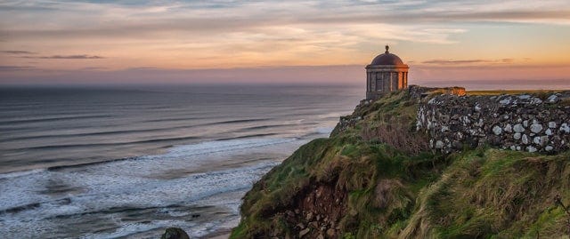 View of Mussenden Temple overlooking the sea in County Derry